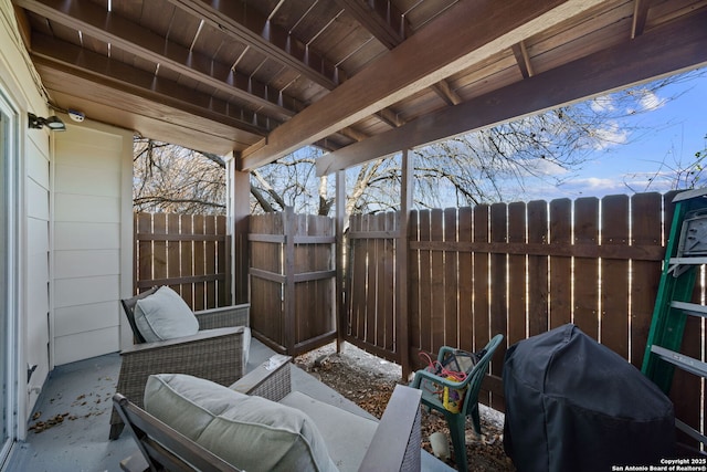 view of patio featuring a grill and an outdoor hangout area