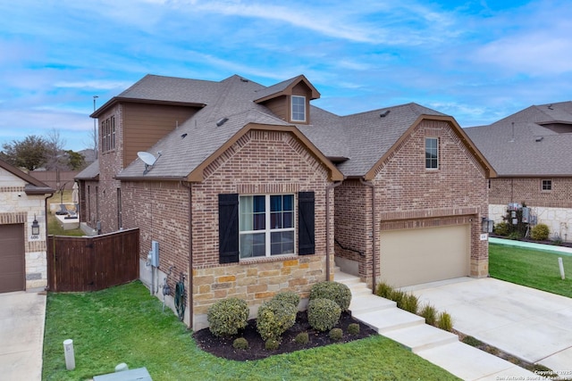 view of front of house with a garage and a front yard