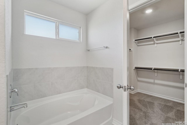 bathroom with a bathing tub