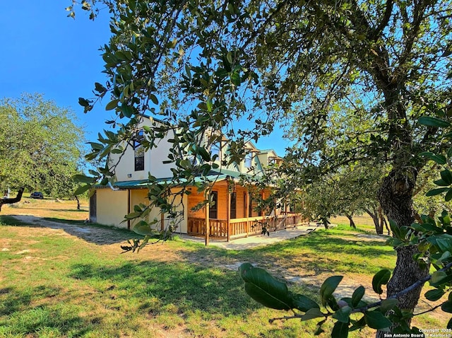 view of yard featuring a wooden deck