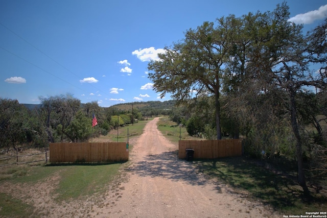 view of road with a rural view