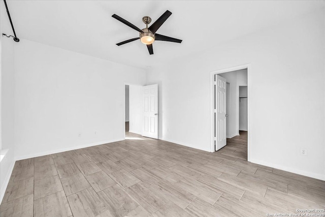 spare room featuring ceiling fan