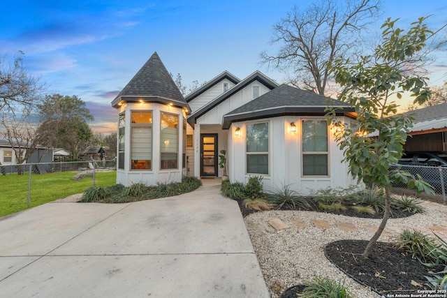 view of front of home with a yard