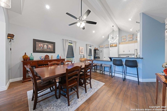 dining space featuring ceiling fan with notable chandelier, beam ceiling, and high vaulted ceiling