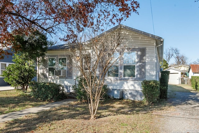 view of front of property featuring cooling unit