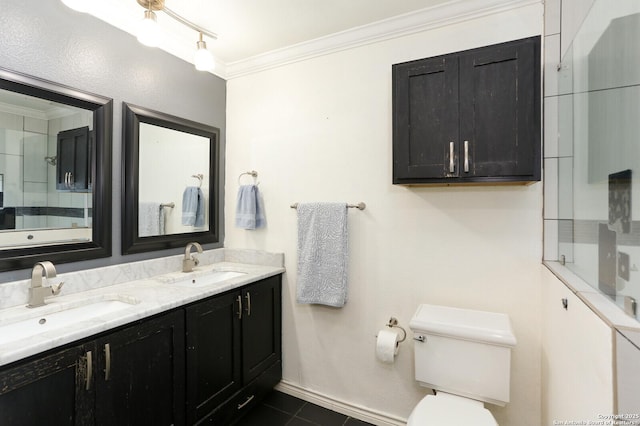 bathroom with vanity, tile patterned floors, ornamental molding, and toilet