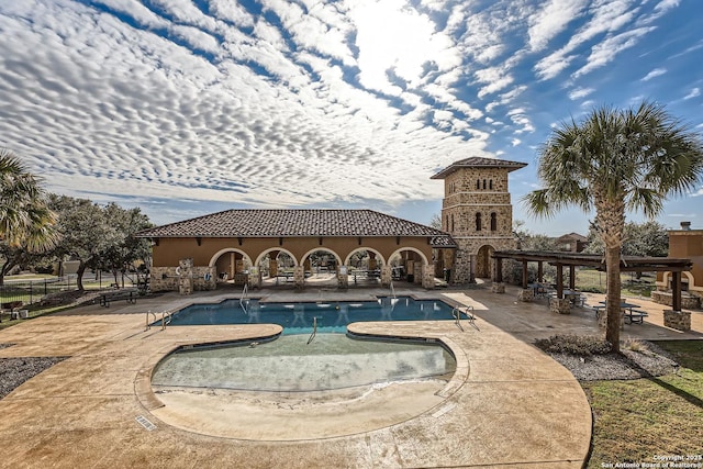 view of swimming pool featuring a patio area