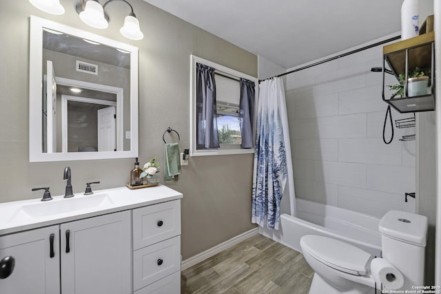 full bathroom with vanity, toilet, hardwood / wood-style floors, and shower / bathtub combination with curtain