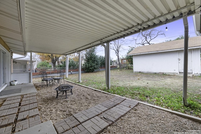 view of patio featuring a fire pit