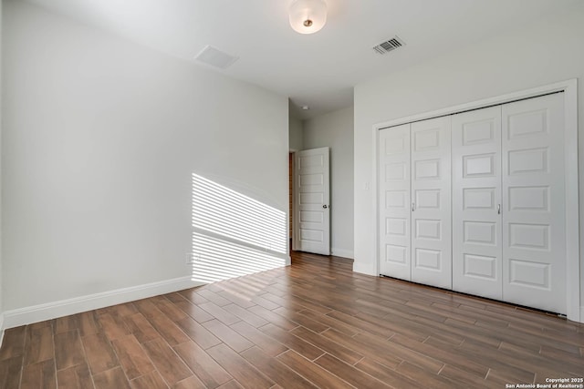 unfurnished bedroom with a closet