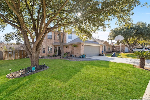 view of front of home with a garage and a front yard