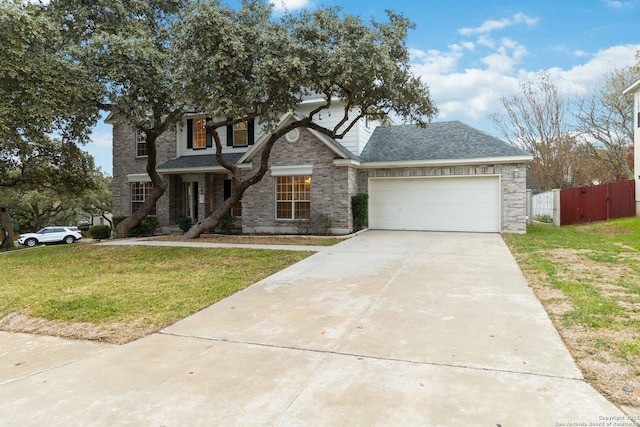 view of front of property with a garage and a front lawn