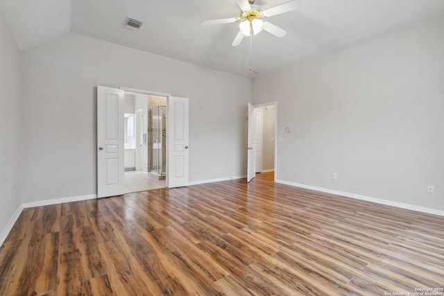 unfurnished room featuring ceiling fan, high vaulted ceiling, and hardwood / wood-style floors