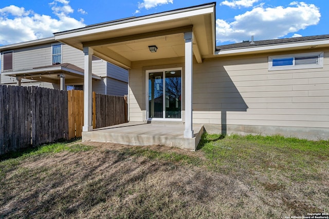 rear view of house featuring a patio