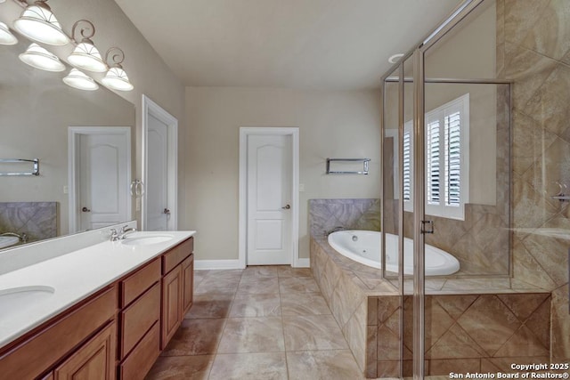 bathroom with independent shower and bath, vanity, and tile patterned flooring