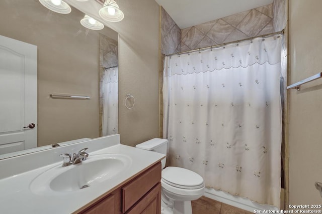 full bathroom featuring vanity, tile patterned flooring, shower / bath combo, and toilet