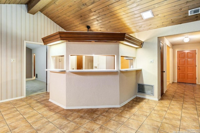 kitchen with white refrigerator with ice dispenser, lofted ceiling with beams, wooden ceiling, and kitchen peninsula