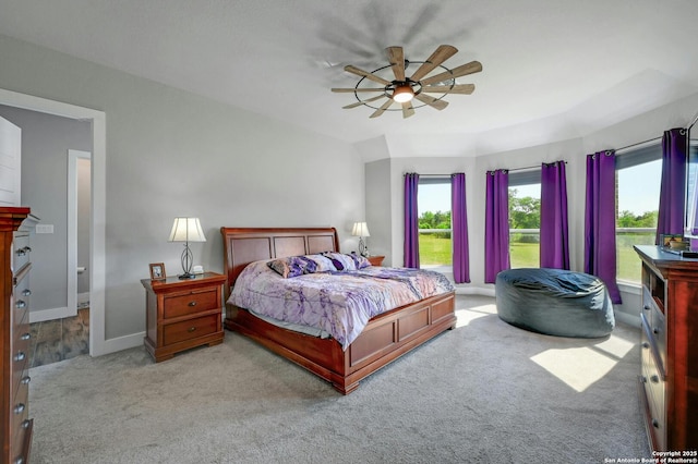 bedroom with light colored carpet and ceiling fan