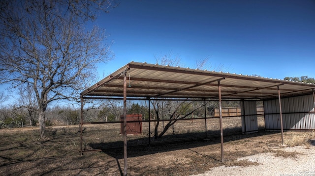 exterior space featuring a carport