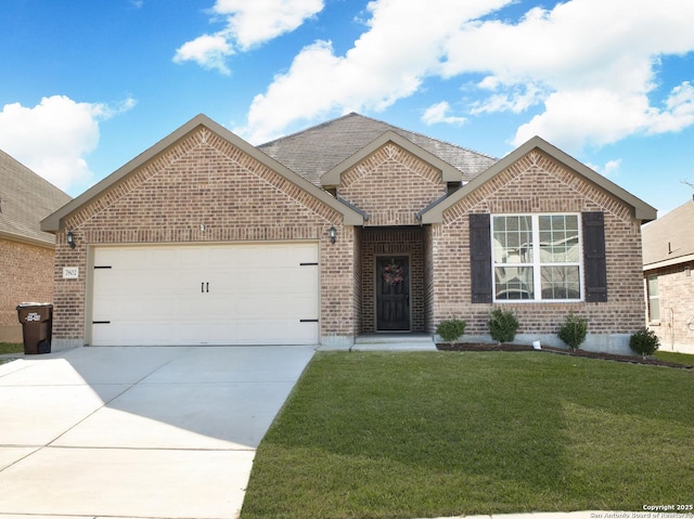 ranch-style house with an attached garage, brick siding, a shingled roof, concrete driveway, and a front yard