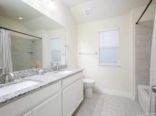 full bathroom featuring lofted ceiling, shower / tub combo, vanity, tile patterned floors, and toilet