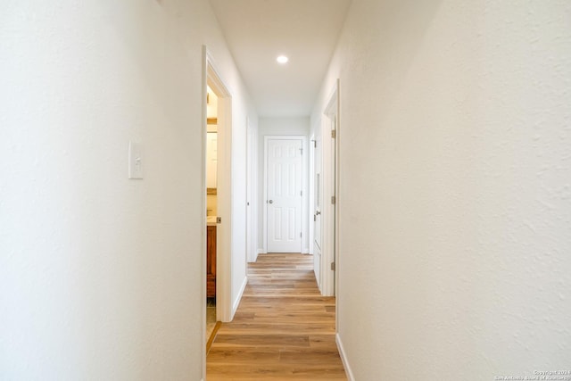 hall featuring light wood-type flooring