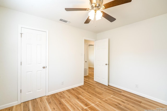 unfurnished bedroom with a closet, ceiling fan, and light hardwood / wood-style floors