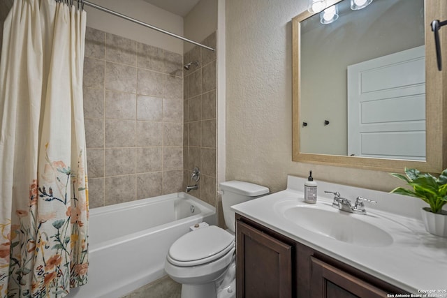 full bathroom featuring vanity, shower / tub combo, and toilet