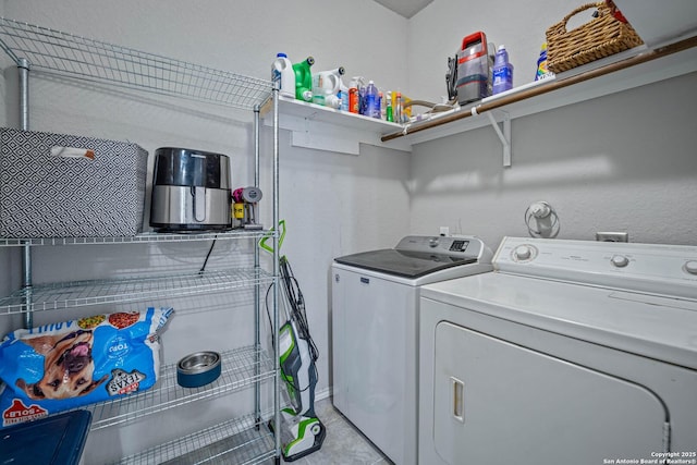 laundry room with washing machine and dryer