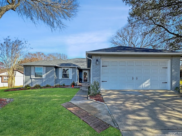 single story home featuring a garage and a front yard