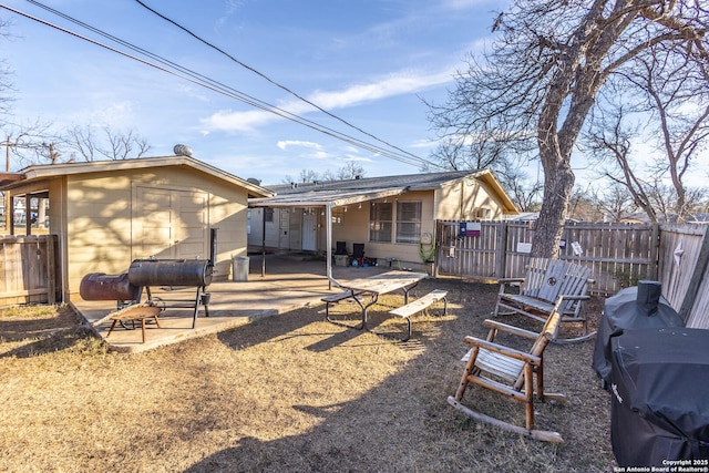 rear view of house featuring a patio