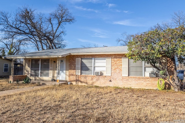 single story home with cooling unit