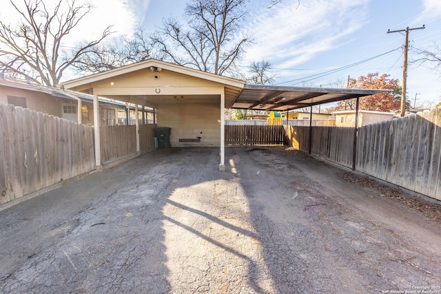 view of parking featuring a carport