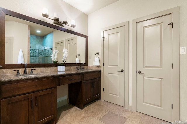 bathroom with vanity and walk in shower