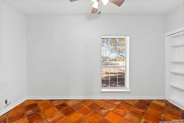 spare room featuring ceiling fan