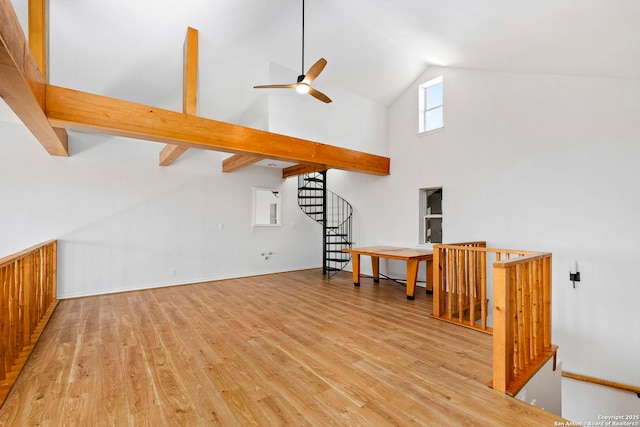 living room featuring high vaulted ceiling, ceiling fan, and light hardwood / wood-style flooring