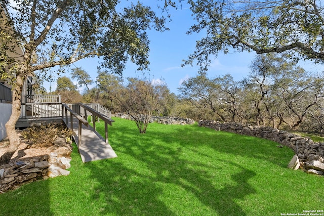 view of yard featuring a deck