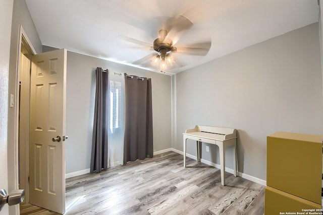 interior space with ceiling fan and light hardwood / wood-style floors