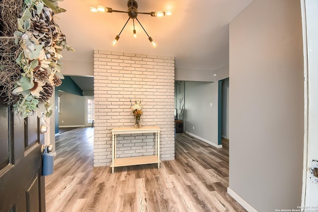 unfurnished living room featuring wood-type flooring