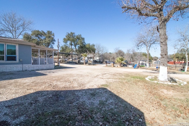 view of yard with a playground