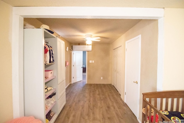 hallway featuring wood-type flooring