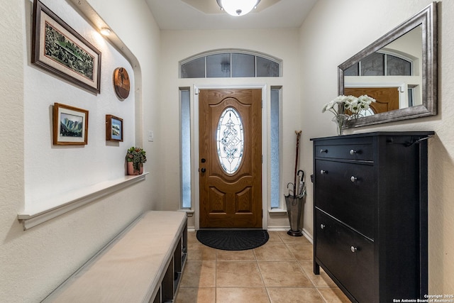 entrance foyer featuring light tile patterned flooring