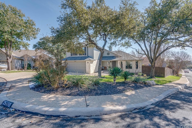 view of front of property with a garage