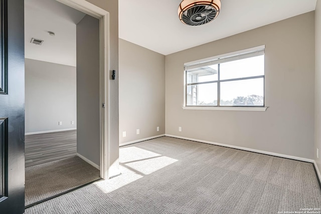 view of carpeted spare room