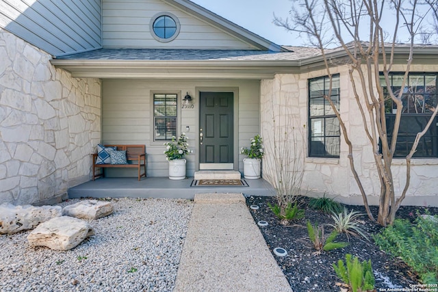 entrance to property with covered porch