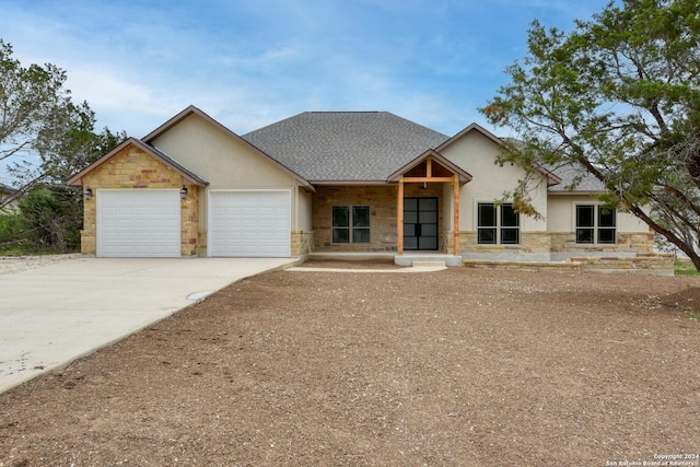 view of front of property featuring a garage