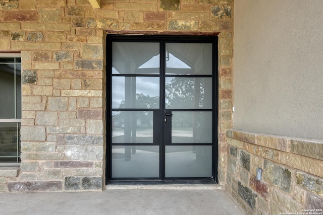 entrance to property with french doors