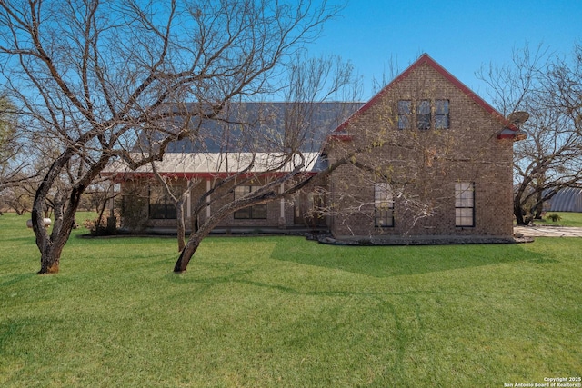 view of front of home with a front yard