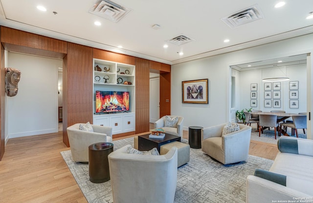 living room with light hardwood / wood-style flooring