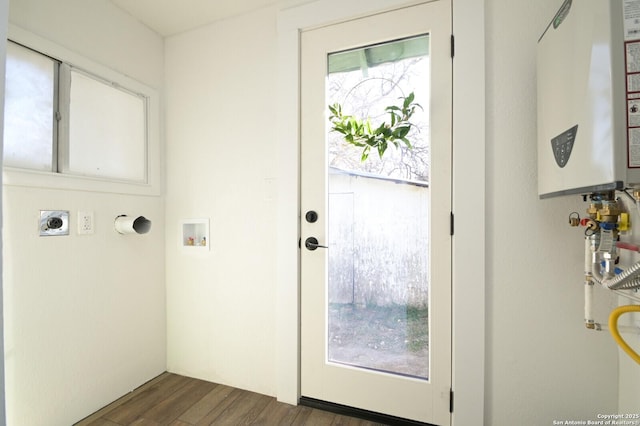 interior space featuring dark wood-style flooring and water heater